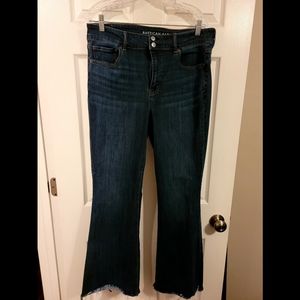 AE High-Waisted Artist Flare Jean · Super Stretch. Ripped Ankle Hem